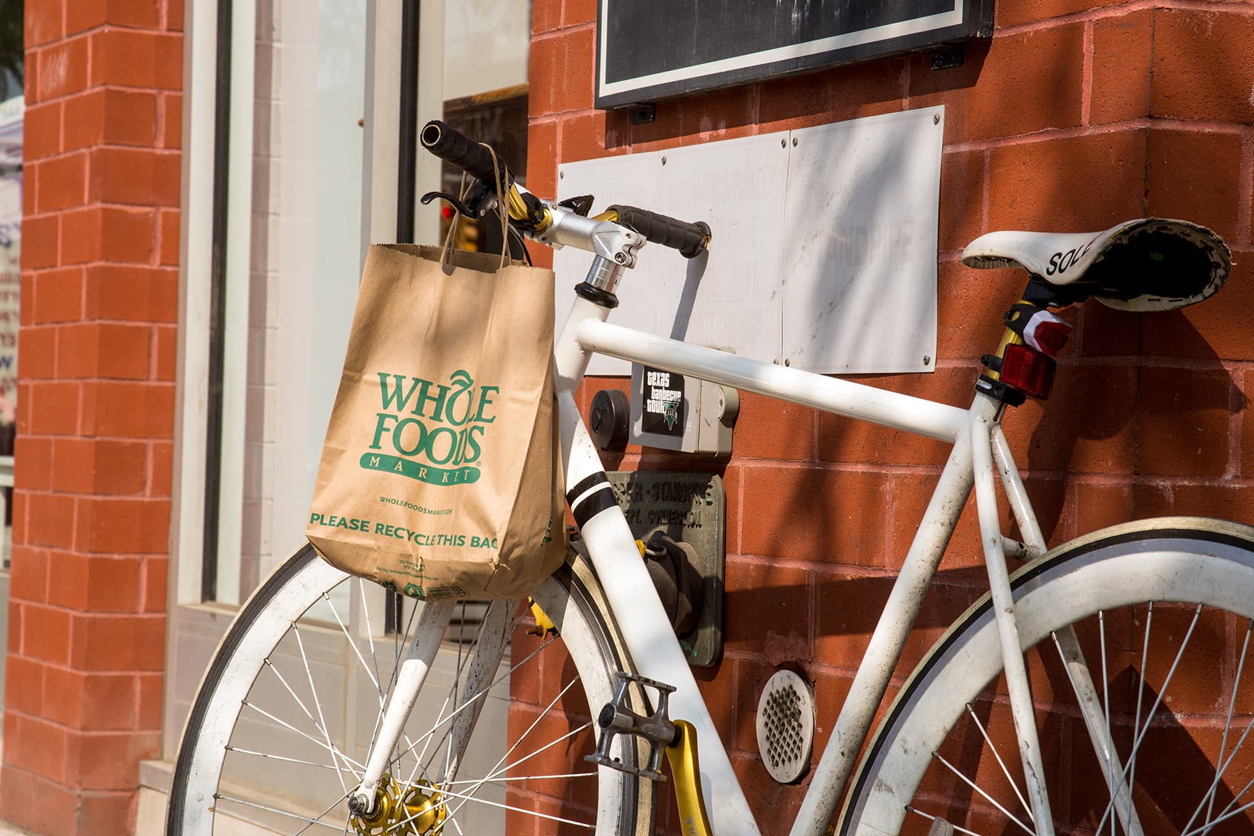 Bike Detail with Whole Foods Market Small Grocery Bag